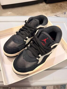 Size 6Y Jordan Black Sneakers with Cream Accents and Red Jumpman